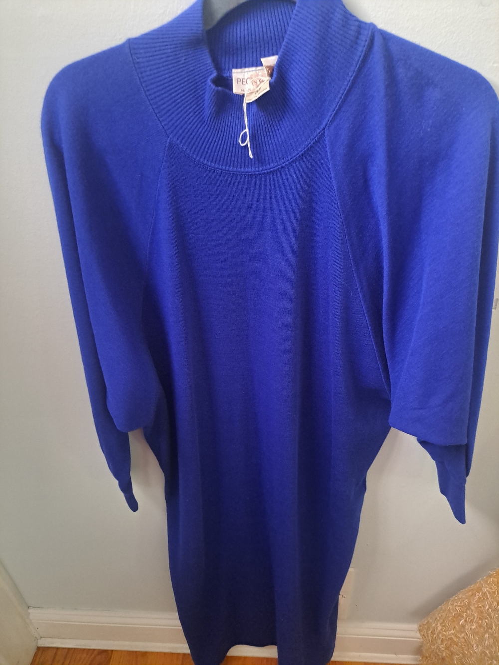 New without tags royal blue knit sweater Dress medium. This garment is made